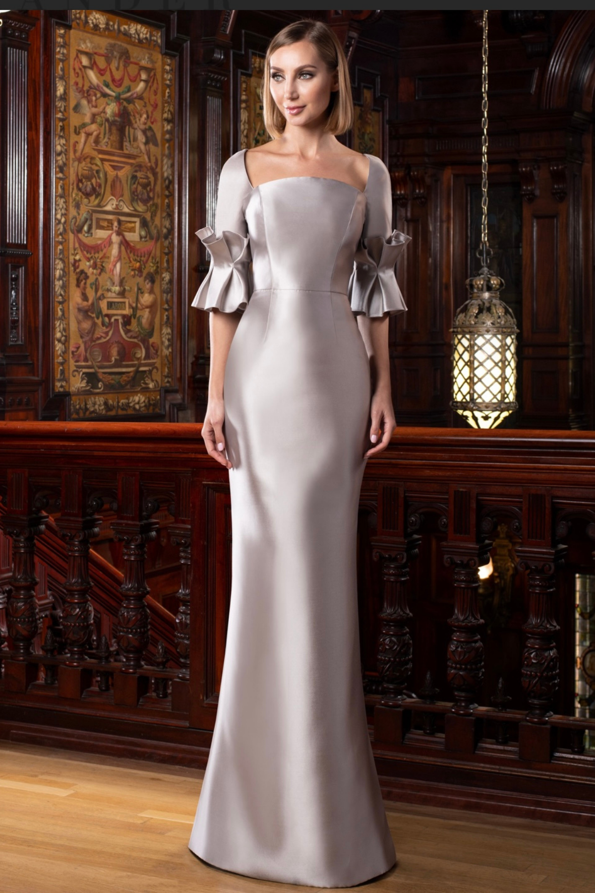 Stunning 3/4 sleeve with Pleated cuff gown - Park Lane Styling & Consulting